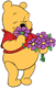 Winnie the Pooh smelling flowers