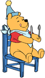 Winnie the Pooh sitting on a chair waiting for birthday cake